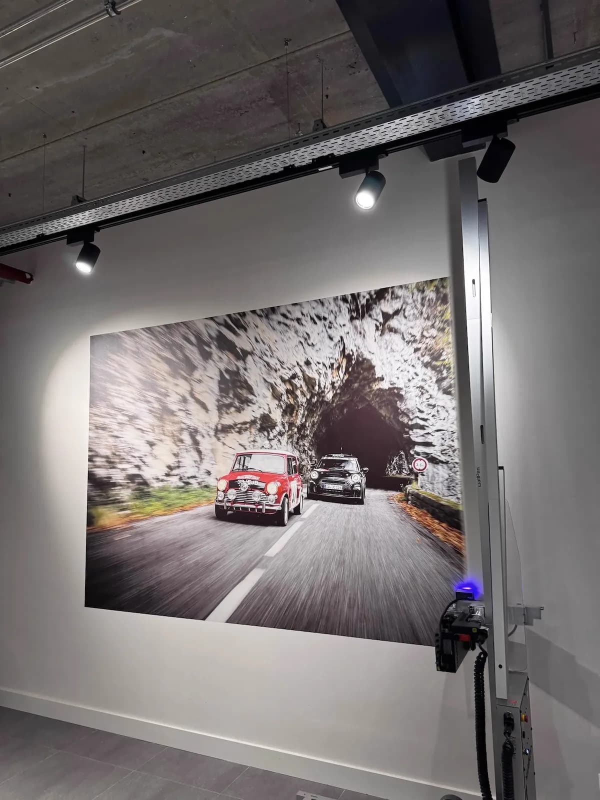 Car showroom wall mural featuring classic Mini Coopers in tunnel by InnoPrint KSA