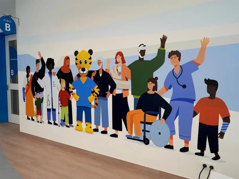 Healthcare facility wall printing with inclusive community artwork by InnoPrint KSA